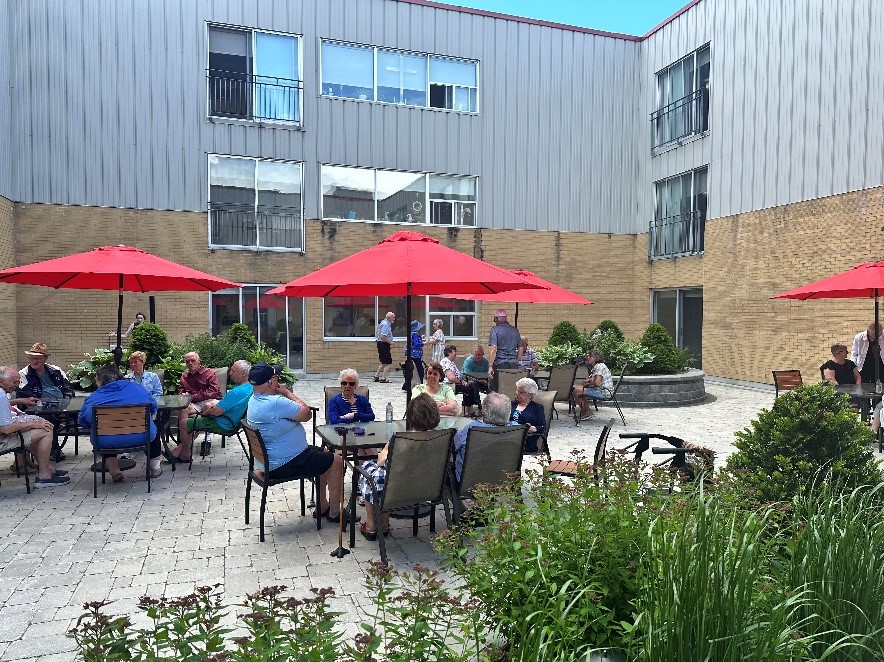 The anniversary event was a joyous occasion featuring great weather, lively music, dancing, and a celebratory BBQ.jpg