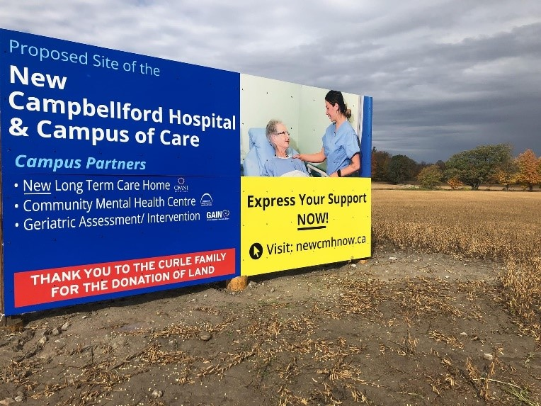 Campus of Care Sign.png